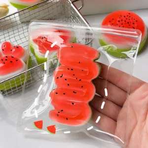Detailed macro view of a watermelon-shaped squishy toy inside a clear zipper bag