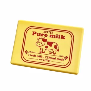 Yellow butter-shaped slow rebound PU squishy toy with cute cow print for stress relief