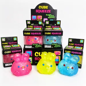 Set of three colorful rabbit maltose squeeze toys with retail packaging box details.
