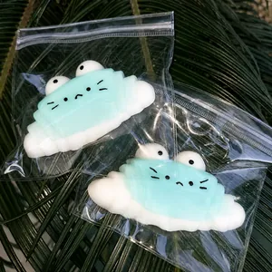 Detail showing cute cat-faced croissant squishy toys individually packed in clear plastic bags