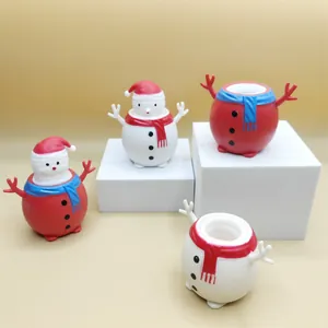Jouets à presser Père Noël et Bonhomme de neige pour soulager le stress des enfants