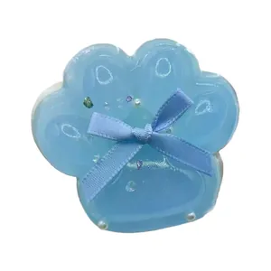 Χαριτωμένο γαλάζιο ημιδιαφανές παιχνίδι squishy πατούσα γάτας με φιόγκο για άγχος.