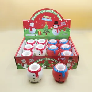 Vue détaillée de jouets à presser bonhomme de neige de Noël dans un coffret de 12