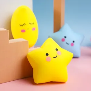 Close-up detail of cute yellow star squeeze toy with happy facial expression for stress relief