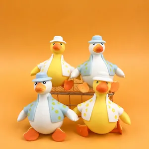 Set of four cartoon dress-up duck squishy squeeze toys for children's stress relief
