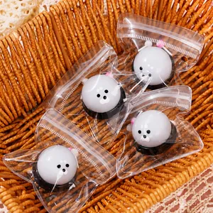 Macro view of cute seal squishy toys individually packed in clear plastic bags inside a basket