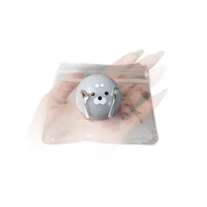 Cute grey seal squishy toy with spoon and fork chef design for stress relief and fun