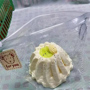 Realistic cream Gugelhupf cake squishy toy in plastic packaging for stress relief
