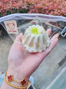 Realistic Gugelhupf cake squishy toy made of slow-rebound silicone, handheld close-up view