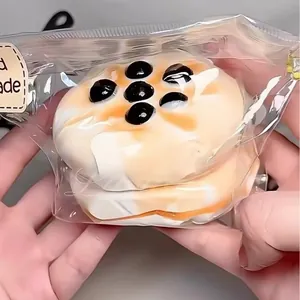 Realistic brown sugar pearl toast squishy toy for stress relief in a clear packaging bag.