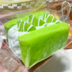 Grünes Melonen-Toast-Squishy-Spielzeug aus weichem Silikon in Lebensmittelqualität