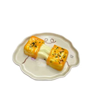 Realistic silicone squishy toy shaped like seaweed cheese rice cake for stress relief