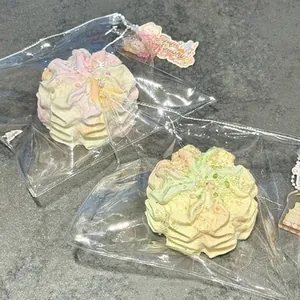 Pastel swirl shaped food grade silicone squishy stress relief toys in clear packaging