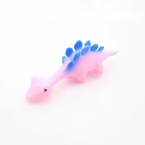 Small pink and blue slingshot dinosaur toy for stress relief and finger prank games.