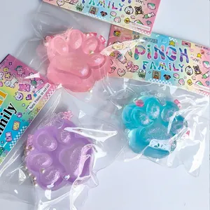 Translucent glitter silicone cat paw squeeze toys for stress relief, pink blue purple set.