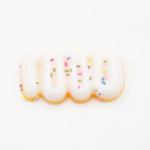 Close-up detail van een gesimuleerd gegolfd brood squishy speelgoed met hagelslag