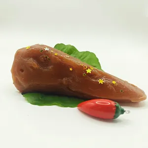 Detailed macro view of a realistic brown duck head squishy stress relief toy with gold stars