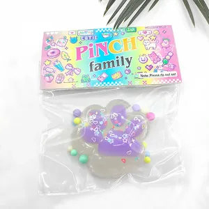 Sunlight reactive color-changing cat paw squishy toy in cute pixel art packaging