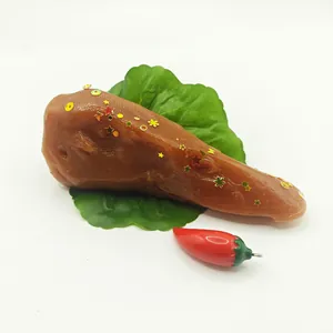 Detailed view of simulation duck head squeeze toy with golden glitter stars decoration