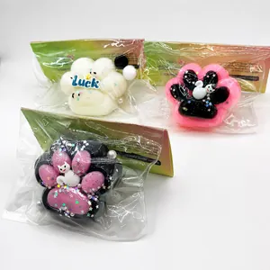 Set van drie kleurrijke siliconen kattenpoot squishy speelgoed in verpakking