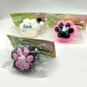 Soft cat paw squishy stress relief toy with pearly glitter in various colors