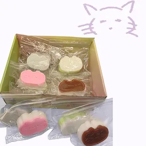 Close-up view of colorful cat-shaped slow rebound squishy toys in individual zip-lock bags