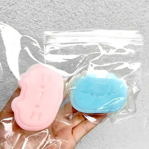 Cute Pusheen-style cat squishy toys in pink and blue packaging for effective stress relief