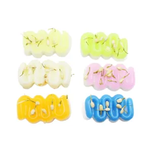Kleurrijke golvende churro-squishy-speeltjes met gedroogde jasmijn voor stressverlichting