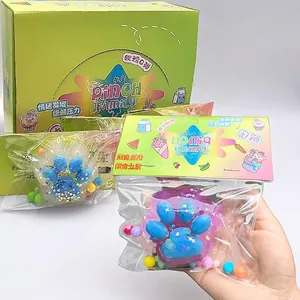 Close-up view of sun-activated color-changing cat paw squishy stress relief toy