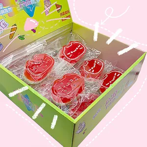 Set of red cat-shaped squishy stress relief toys in a decorative green gift box.