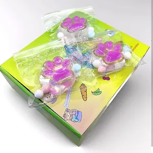 Three translucent pink cat paw squishy toys with foam balls in clear bags for stress relief