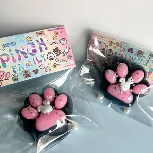 Cute pink cat paw squishy stress relief toy set with decorative pearls