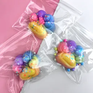 Colorful glossy cat paw squishy toy for stress relief with rainbow glitter 7x7cm 82g