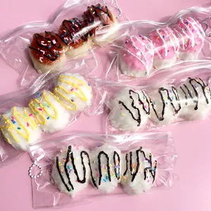 Detail of 3-piece dango squishy toys in various flavors and colorful sprinkles.