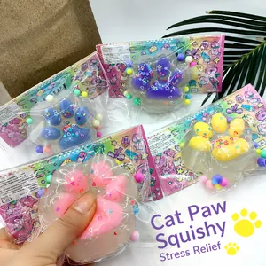 Color-changing cat paw squishy stress relief toy available in pink blue purple and yellow colors