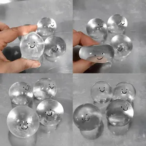 Detailed macro view showing the slow-rebound texture of a clear smiley squishy toy ball