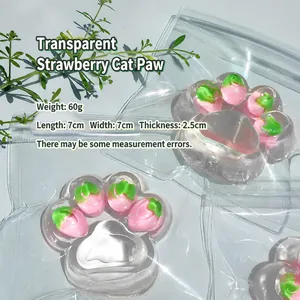 Macro detail view of the transparent strawberry cat paw squishy stress relief toy