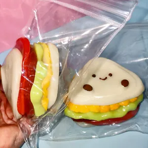 Detailed view of a soft slow-rebound sandwich squishy toy in clear packaging bag
