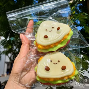 Realistic sandwich squishy toy for stress relief featuring a cute smiling face design