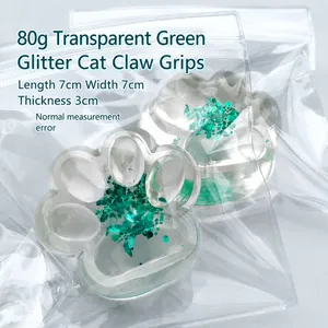 Macro detail of translucent green aurora cat paw squishy toy with glitter filling