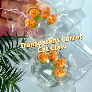 Detailed view of two transparent cat paw squishy toys featuring pineapple patterns