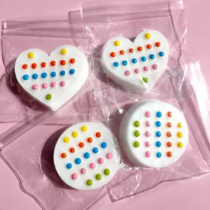 Detailed view of colorful silicone heart and round fidget toys in clear packaging