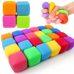 Macro shot showing the soft and flexible texture of various colorful maltose squeeze cubes.