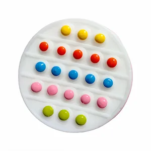 Colorful round silicone fidget pop-it toy for stress relief shown on white background