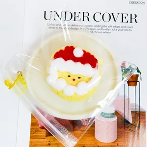 Close-up detail of the Santa Claus silicone squeeze toy in packaging with weight information