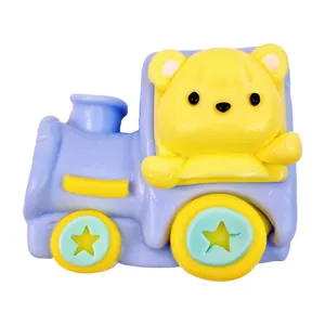 Macro detail of a yellow bear sitting in a lavender silicone toy train squishy stress toy