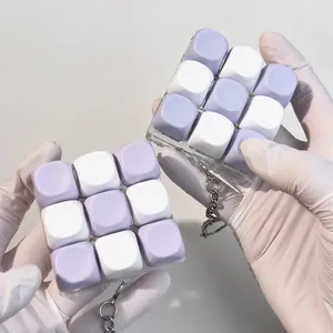 Detailed view of 9-key macaron mechanical switch tester fidget toy keychain purple white