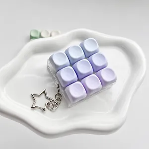 Nine-key mechanical switch tester fidget toy keychain for office stress relief and focus