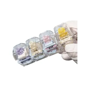 4-key mechanical switch tester keychain with transparent keycaps for stress relief