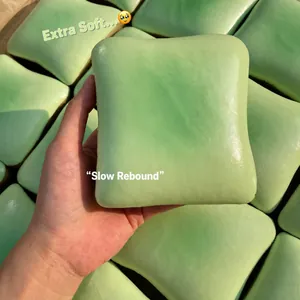 Detailed close-up of a soft green jasmine toast squishy toy with slow rebound texture